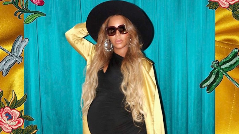 Beyonce pregnancy style black dress hat