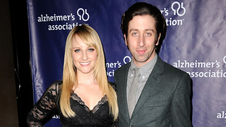 Simon Helberg and Melissa Rauch posing.