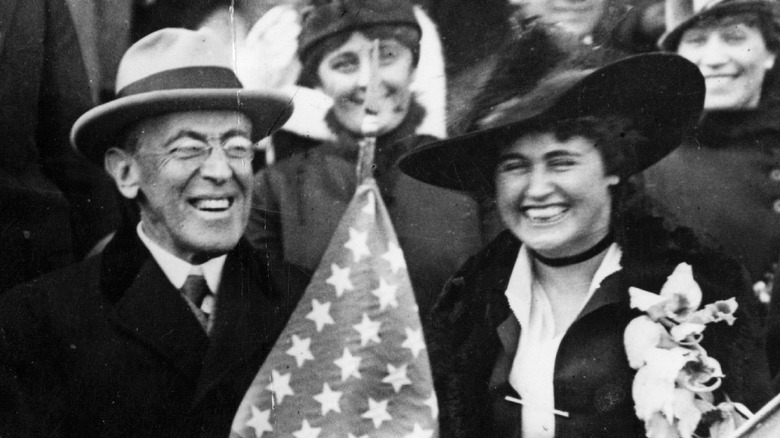 Edith and Woodrow Wilson smiling at an event