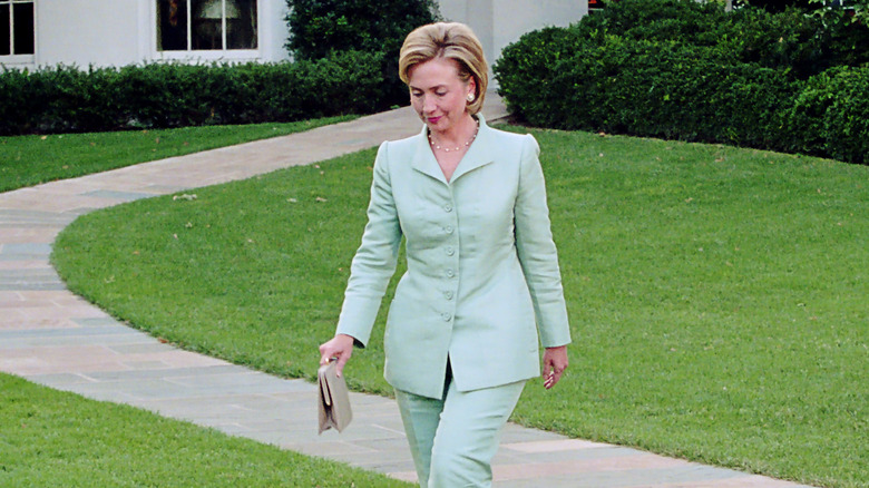 Hillary Clinton leaving White House meeting in pantsuit.