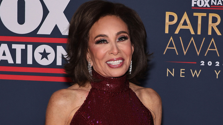 Jeanine Pirro grinning