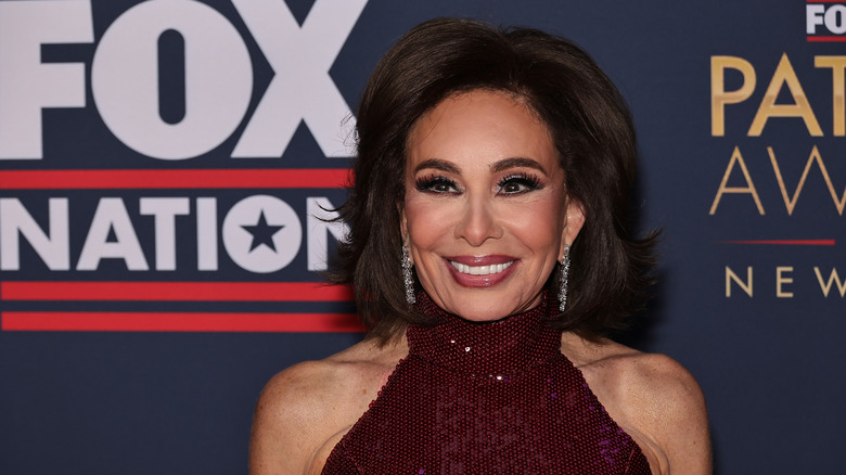 Jeanine Pirro grinning