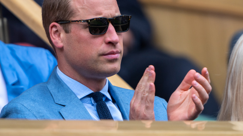 Prince William clapping at event