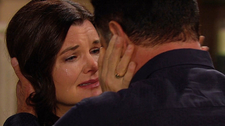 Katie crying as she holds Bill on The Bold and the Beautiful