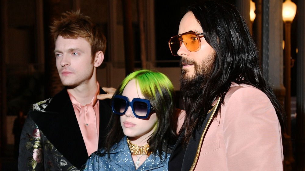 Finneas O'Connell, Billie Eilish, and Jared Leto pose for a photo together