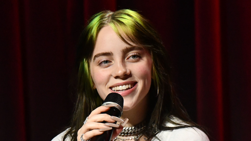 Billie Eilish speaks onstage during an interview