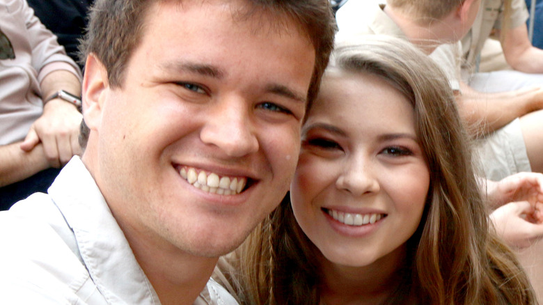 Bindi Irwin and her husband Chandler Powell smiling