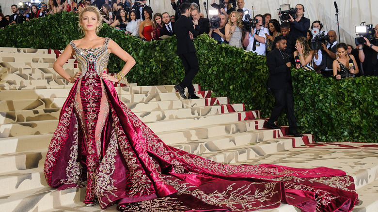 Blake Lively in a burgundy gown at the 2018 Met Gala