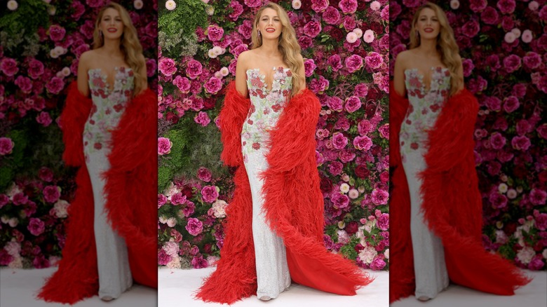 Blake Lively at the "It Ends With Us" 2024 premiere in London in a flower gown with a fluffy jacket