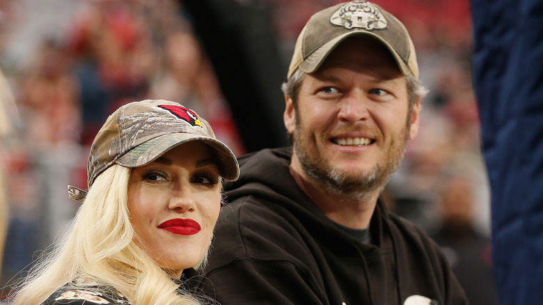 Gwen Stefani and Blake Shelton at football game