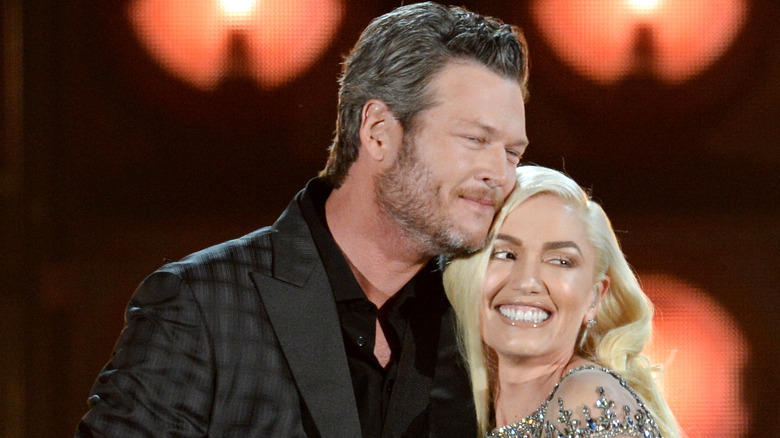 Blake Shelton hugging Gwen Stefani