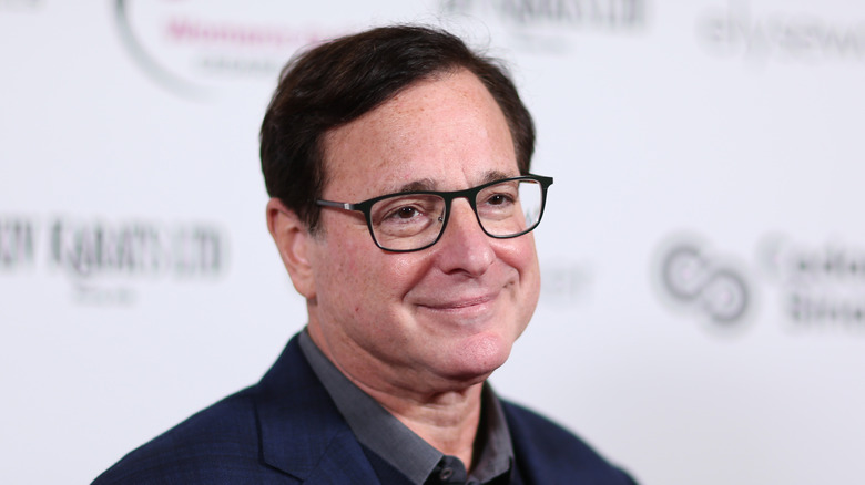 Bog Saget poses at an event. 