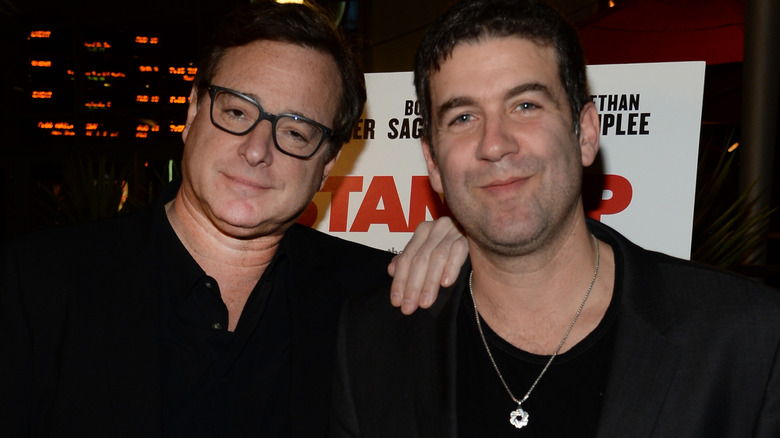 Bob Saget and Mike Young posing