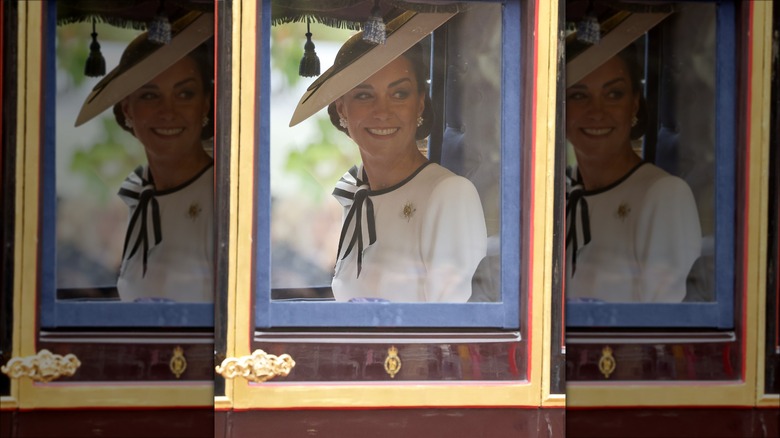 Kate Middleton smiling in carriage