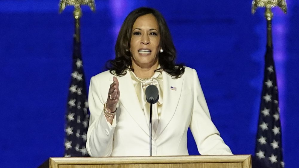 Kamala Harris gestures with hand