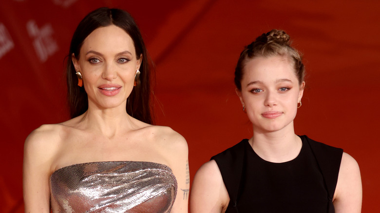 Shiloh Jolie-Pitt with her mom Angelina Jolie