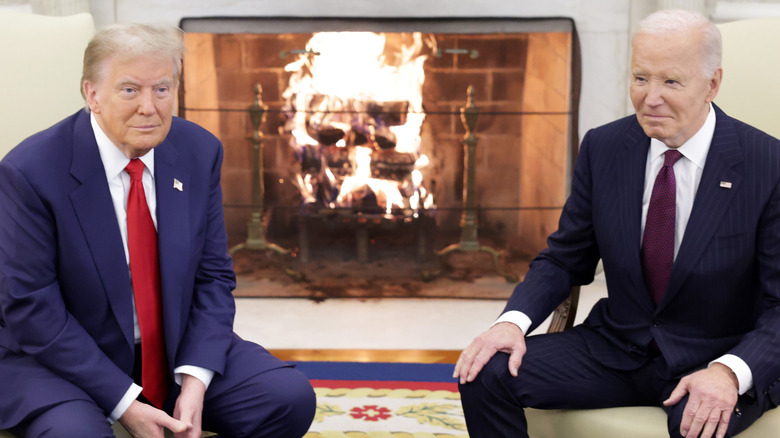 Donald Trump and Joe Biden sit awkwardly next to each other in the oval office