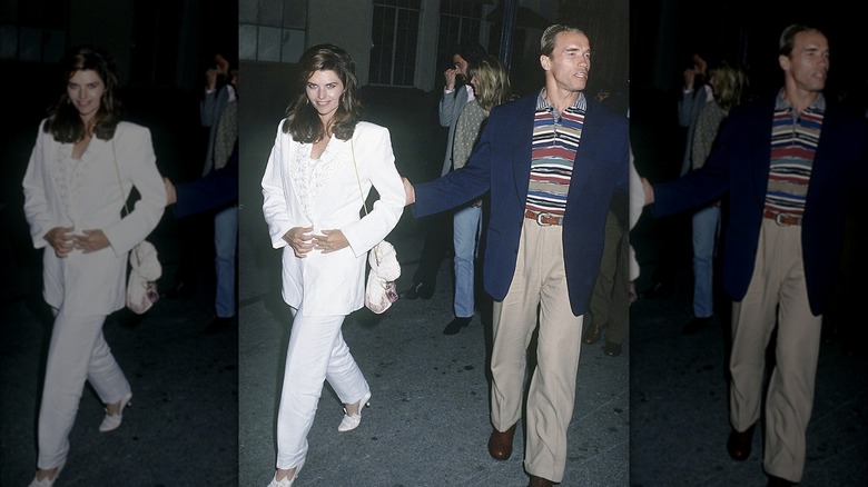 Maria Shriver and Arnold Schwarzenegger walking 