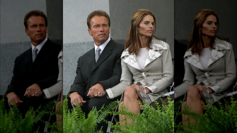 Maria Shriver and Arnold Schwarzenegger sitting