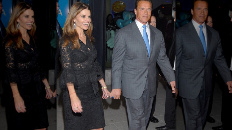 Maria Shriver and Arnold Schwarzenegger holding hands