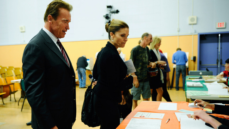 Arnold Schwarzenegger and Maria Shriver at a polling station