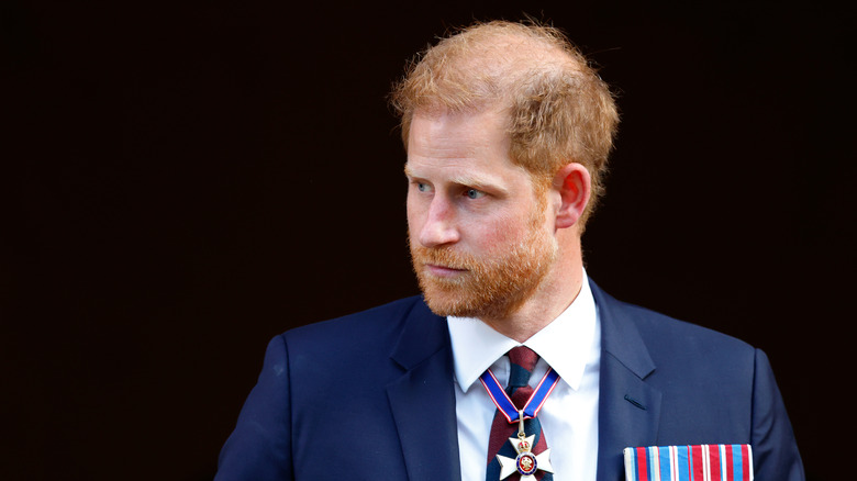 Prince Harry frowning