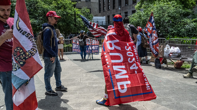 Donald Trump supporters standing outside courthouse