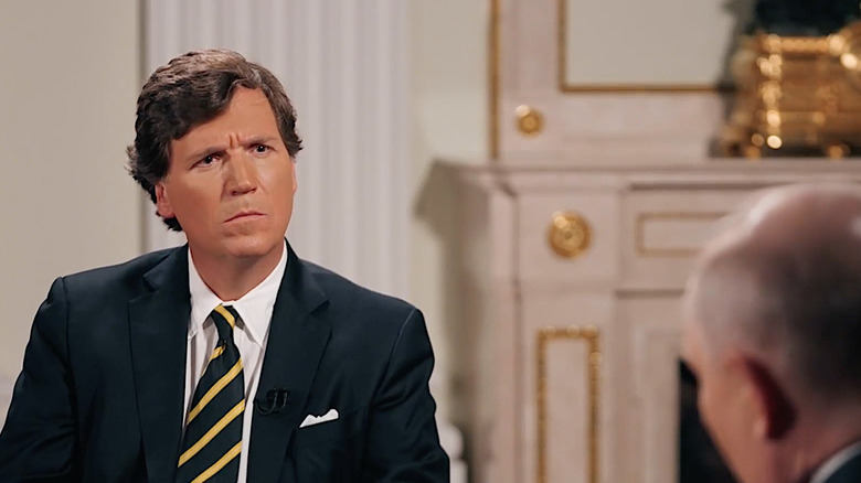 Tucker Carlson's reaction during Vladimir Putin interview