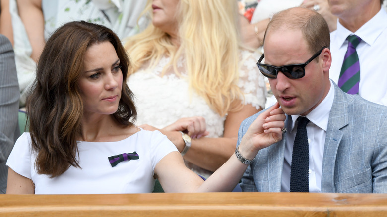 Kate touching William's cheek