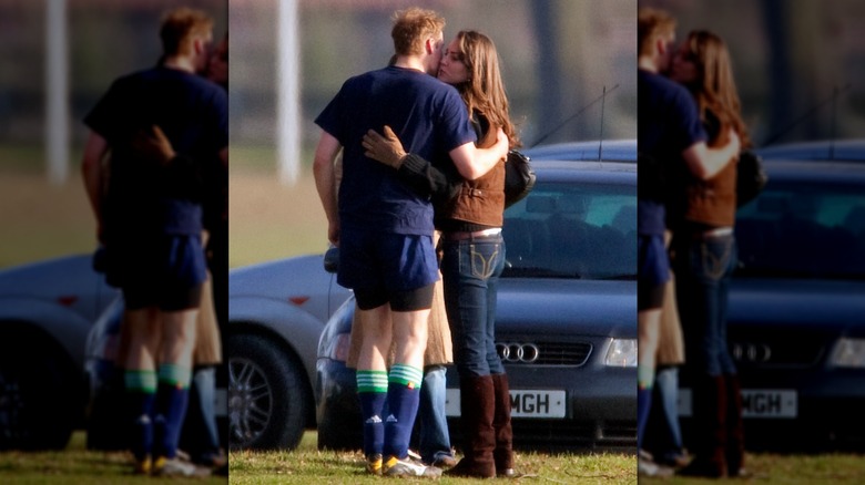 William kissing Kate in front of car