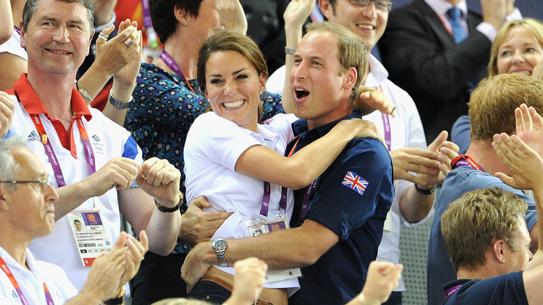 William and Kate hugging celebrating
