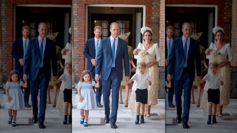 Prince Harry walking behind Prince William and his family