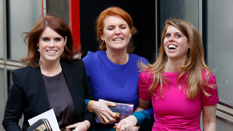 Princess Eugenie, Beatrice, and Fergie laughing