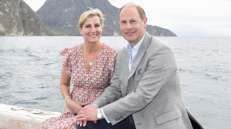 Prince Edward and Sophie against sea backdrop