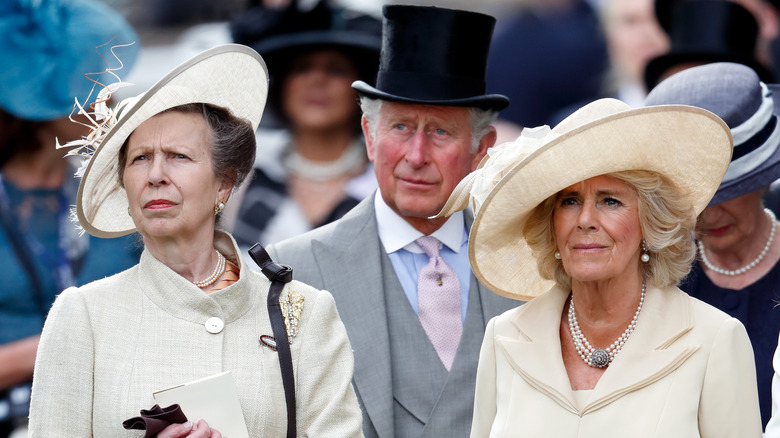 Anne, Charles, and Camilla at event 