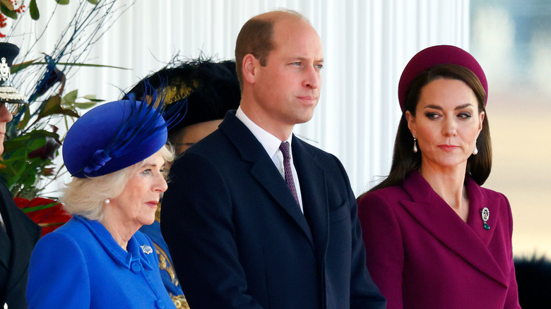 Catherine, William and Camilla standing 