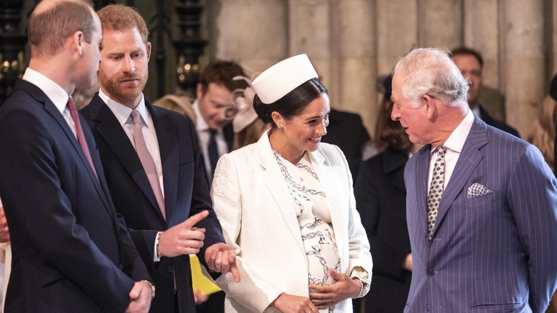 Meghan and Charles talking 