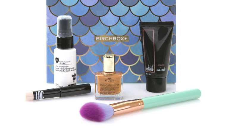 A Birchbox with beauty products in front of it