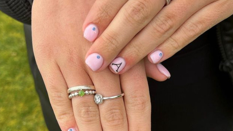 pink manicure with boyfriend nail
