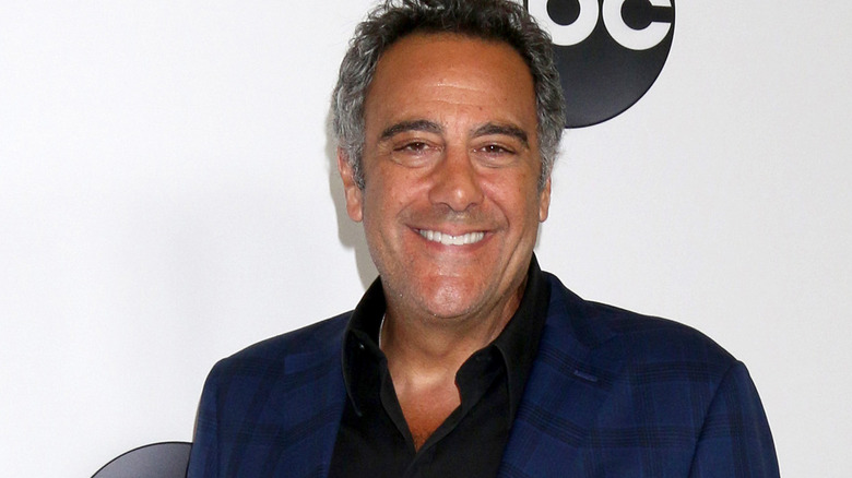 Brad Garrett in blue suit