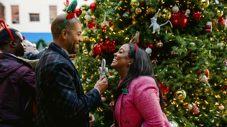 Brad James and Keshia Knight Pulliam smiling at each other