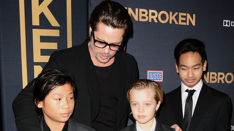 Brad Pitt with three of his kids 2014