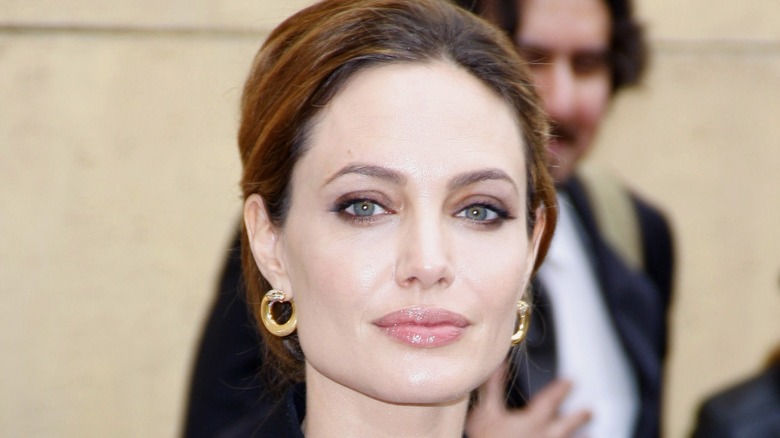 Angelina Jolie poses for photo