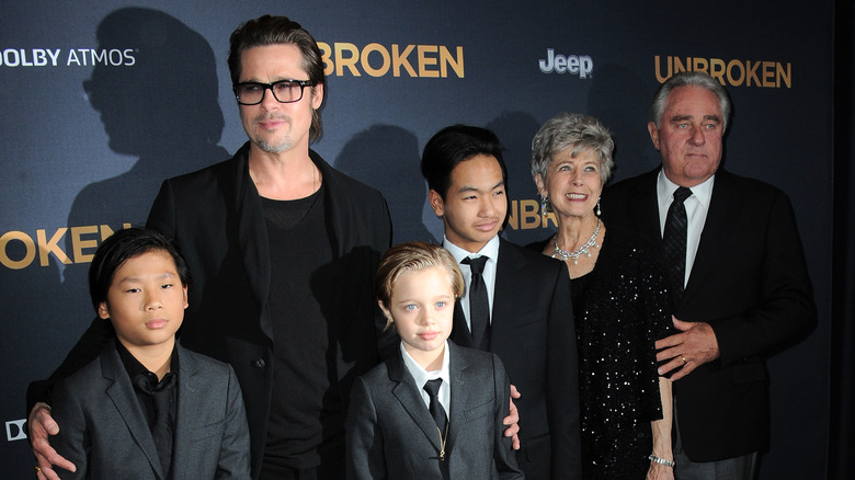 Brad Pitt with his children and parents