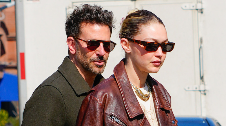 Bradley Cooper and Gigi Hadid wearing sunglasses