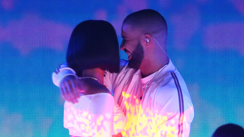 Rihanna and Drake embracing