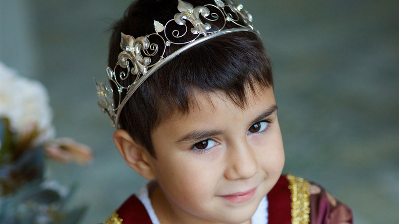 little boy dressed as a prince