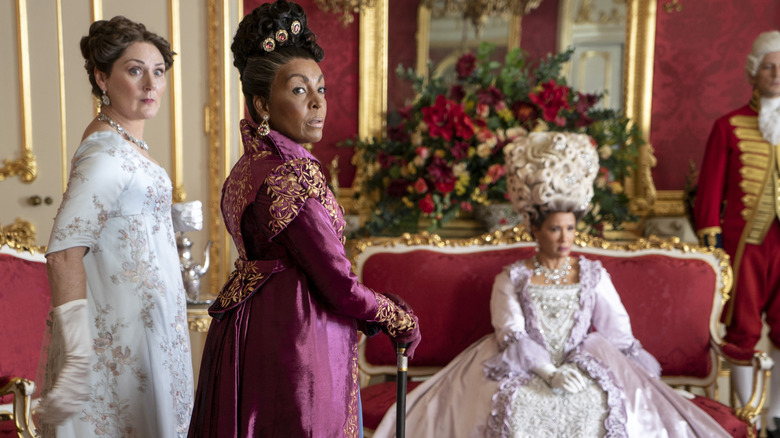 Ruth Gemmell as Lady Violet Bridgerton, Adjoa Andoh as Lady Danbury, and Golda Rosheuvel as Queen Charlotte 