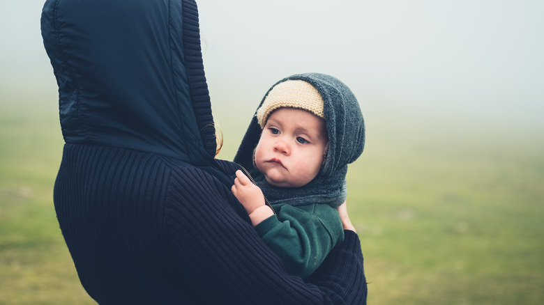 bundled up little boy