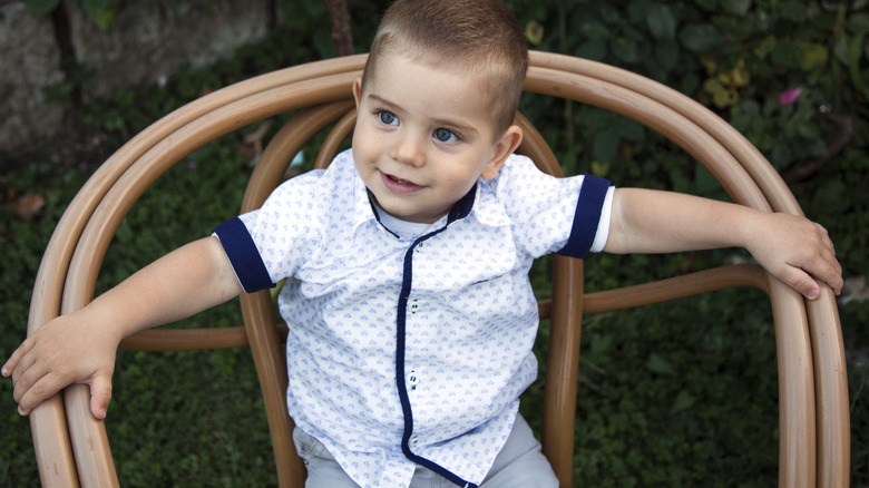 cute little boy in chair